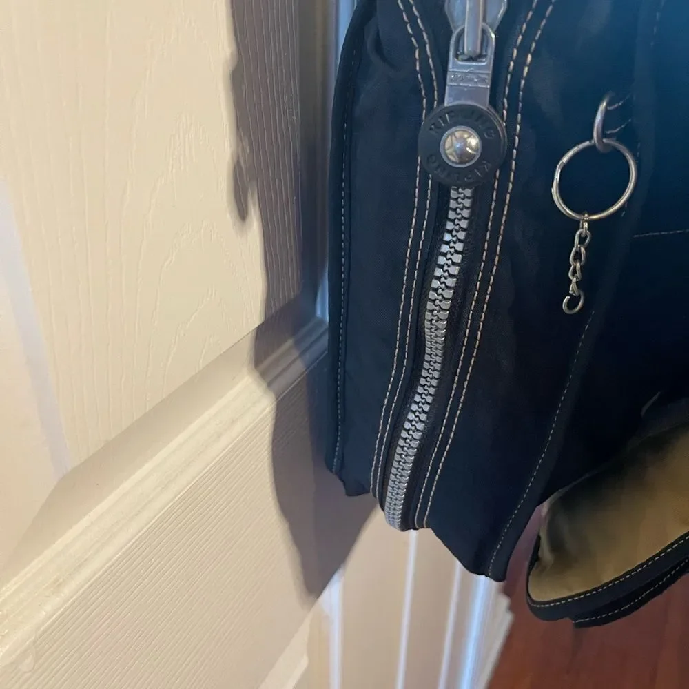 Kipling Nylon Expandable Navy Blue Large Messenger Bag  Key Clip. Black strap .